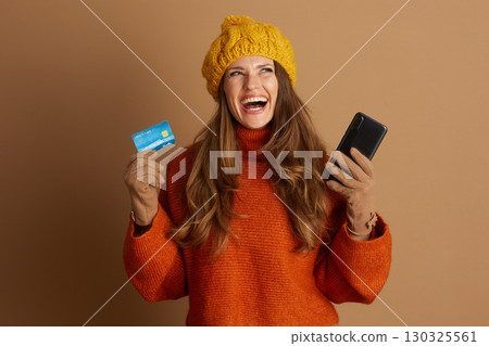 Laughing Woman Enjoying Digital Shopping Laughing Woman Enjoying Digital Shopping 130325561