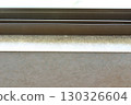 Mold stains on the wall paper near the window 130326604