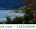 A leisurely sightseeing train running along the Seto Inland Sea 130326606