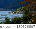 A leisurely sightseeing train running along the Seto Inland Sea 130326607