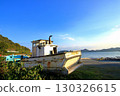 Retired fishing boats and local trains 130326615