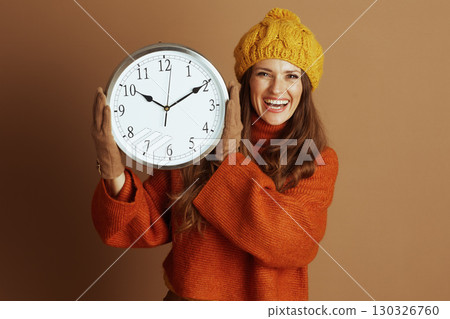 Cheerful Autumn: Woman Holding Time Cheerful Autumn: Woman Holding Time 130326760