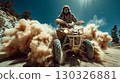 Quad rider making dust cloud on a sunny day 130326881