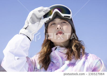 Cute woman enjoying the snow 130327064