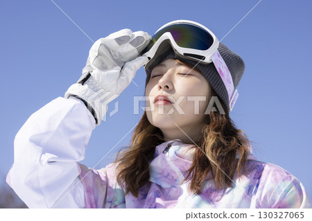 Cute woman enjoying the snow 130327065