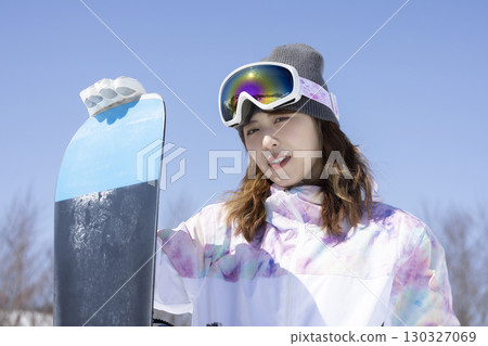 Cute woman enjoying the snow 130327069