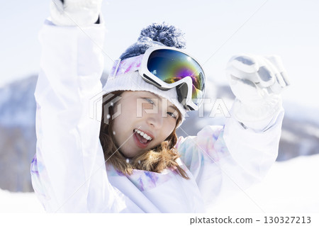 Cute woman enjoying the snow Cute woman enjoying the snow 130327213