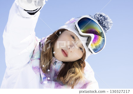 Cute woman enjoying the snow Cute woman enjoying the snow 130327217