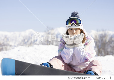 Cute woman enjoying the snow Cute woman enjoying the snow 130327221