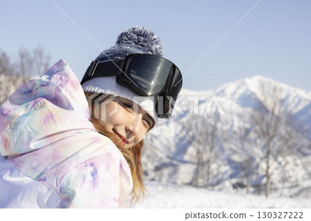 Cute woman enjoying the snow Cute woman enjoying the snow 130327222
