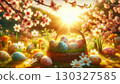 wicker basket filled with beautifully decorated pastel Easter eggs sits on a bed of soft grass, surrounded by blooming flowers and delicate petals. The sun sets in the background, casting a golden 130327585