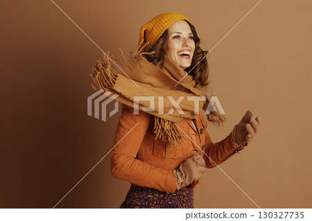 Expressive Joy: Woman Laughing in Autumn Style 130327735
