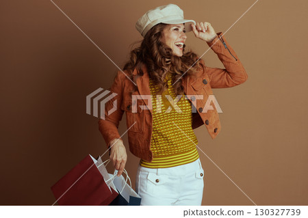 Happy Woman Posing with Autumn Shopping 130327739