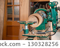 Carpentry, vintage wood lathe turning with copy space. 130328256