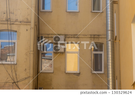 air conditioners are mounted on the wall. technologies for air cooling in hot weather. air conditioners are mounted on the wall. technologies for air cooling in hot weather. 130329624