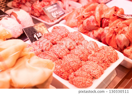 Raw sheep brains on counter of butcher shop Raw sheep brains on counter of butcher shop 130330511