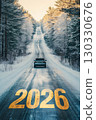 A snowy road leads into the distance with the year 2026 marked on the surface. Pine trees line the sides, creating a winter landscape. 130330676