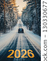 A snowy road leads into a forest, with the year 2026 marked on the pavement. A car drives away, surrounded by tall pine trees and a winter landscape. 130330677