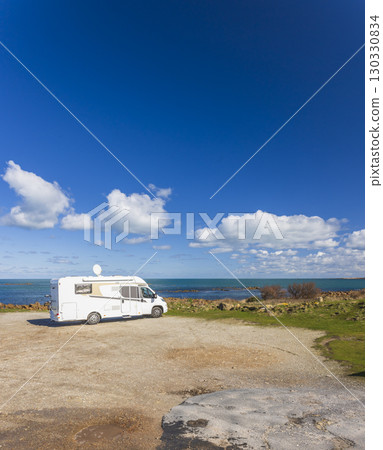 Camper van enjoying breathtaking ocean view in Normandy, France Camper van enjoying breathtaking ocean view in Normandy, France 130330834