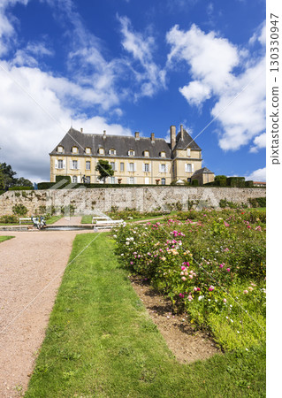 Curbigny Castle rising above rose garden in Burgundy, France 130330947