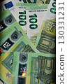 Euro banknotes displayed with vibrant hues highlighting EU currency design and security features, showcasing 100 euro notes with distinct elements illustrating modern currency usage today 130331231