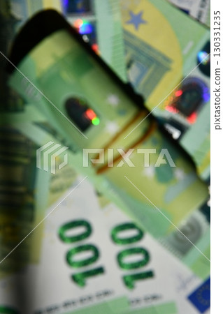 Euro money blurry background showcasing denomination details and holographic patterns to highlight currency design elements Euro money blurry background showcasing denomination details and holographic patterns to highlight currency design elements 130331235