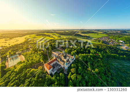 Holy Mountain in Pribram, Czechia serves as a Baroque pilgrimage complex surrounded by lush landscapes. Visitors admire the architecture and tranquil nature during sunny days. Holy Mountain in Pribram, Czechia serves as a Baroque pilgrimage complex surrounded by lush landscapes. Visitors admire the architecture and tranquil nature during sunny days. 130331260