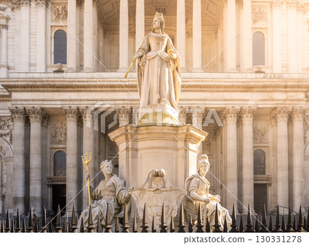 This statue of Queen Anne stands prominently outside St. Paul's Cathedral in London. 130331278