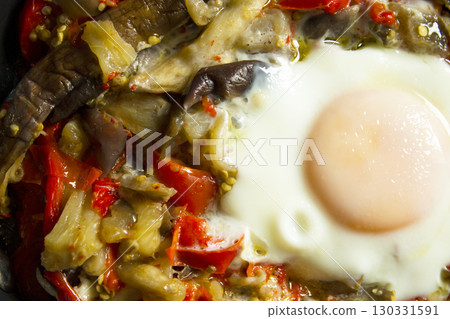 Cooked vegetables with poached egg Cooked vegetables with poached egg 130331591