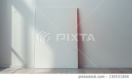 Minimalist blank white frame mock up leaning on gray wall with sunlight in modern interior room 130331808