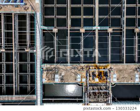 Industrial Water Management Infrastructure Featuring Treatment Pools And Recycling Systems Designed For Energy Efficiency, Sustainability, And Municipal Resource Optimization In Urban Environments 130333224