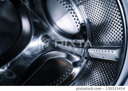 Washing Machine Drum Chrome Interior Close-up 130333454