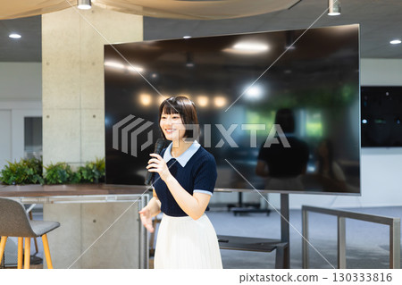 Woman speaking at a seminar 130333816