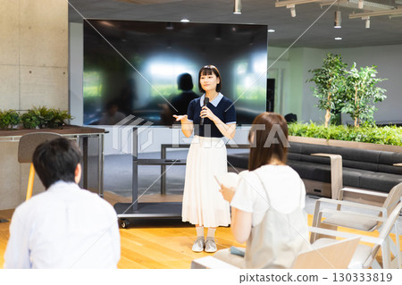 Woman speaking at a seminar 130333819