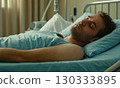 Ill man in hospital bed 130333895