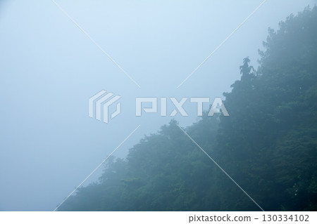 misty mountain landscape 130334102