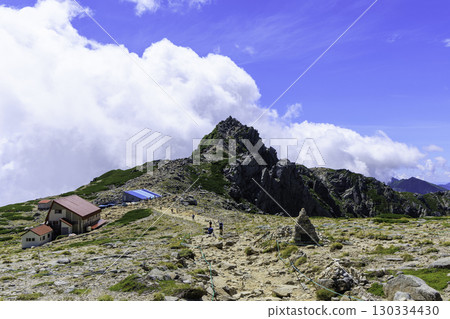 Spectacular views of the Mt. Hoken and the Mt. Hoken and Tenguso lodges on the Kiso Komagatake hiking trail 130334430