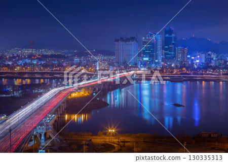 Seoul City and the Railway Bridge, a beautiful night along the Han River in South Korea, South Korea. 130335313
