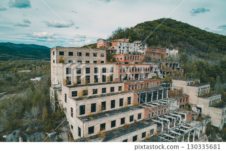 Aerial view of an abandoned mining and processing plant in a mountainous region Aerial view of an abandoned mining and processing plant in a mountainous region 130335681