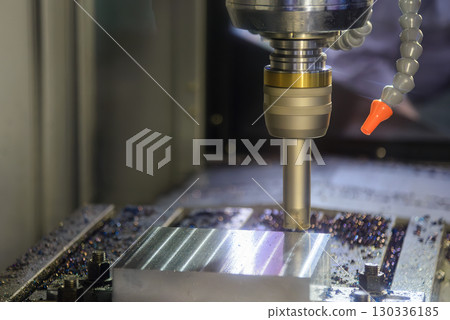 The CNC milling machine rough cutting the mold parts by indexable tools. The CNC milling machine rough cutting the mold parts by indexable tools. 130336185
