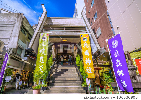 Tokyo cityscape in Japan, including Shinbashi and Karasumori Shrine 130336903