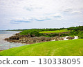A hole overlooking the ocean at a resort golf course with a refreshing tropical blue sky and a view of the sea with its shining coral reefs (Miyakojima City, Okinawa Prefecture) 130338095