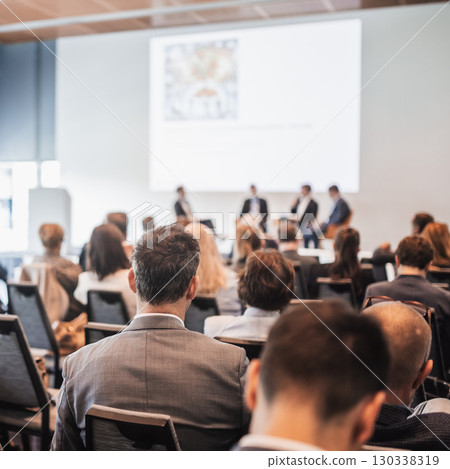 Interview and round table discussion at business convention and presentation. Audience at the conference hall. Business and entrepreneurship symposium. 130338319