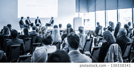Interview and round table discussion at business convention and presentation. Audience at the conference hall. Business and entrepreneurship symposium. 130338341