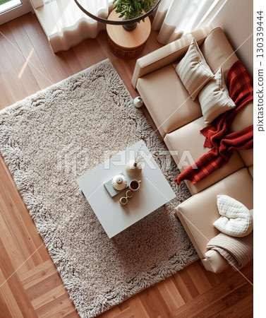 Cozy Living Room Corner with Natural Light and Textures Cozy Living Room Corner with Natural Light and Textures 130339444