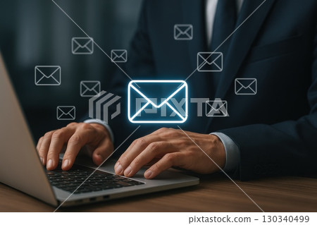 Businessman Engaging in Email Marketing Office Setting Digital Communication Dark Suit Closeup View Outreach Strategy 130340499