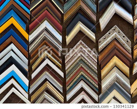 Colorful frame samples for paintings and photographs. Artistic design, decoration, and creative choices for interior styling. Colorful frame samples for paintings and photographs. Artistic design, decoration, and creative choices for interior styling. 130341129