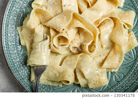 pasta papardelle in creamy garlic sauce, traditional Italian cuisine, pasta carbonara, homemade, no people, 130341178