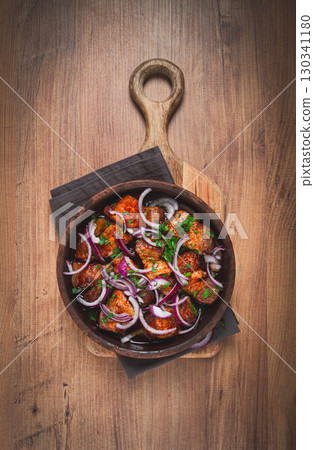fried meat, pork kebab, ketsi in a clay pan, with red onions and herbs, homemade, no people, 130341180