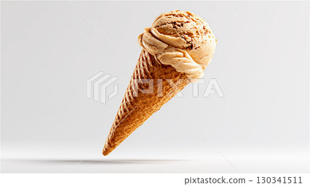 Caramel nut ice cream floating on a white background. A rich and delicious summer dessert. 130341511